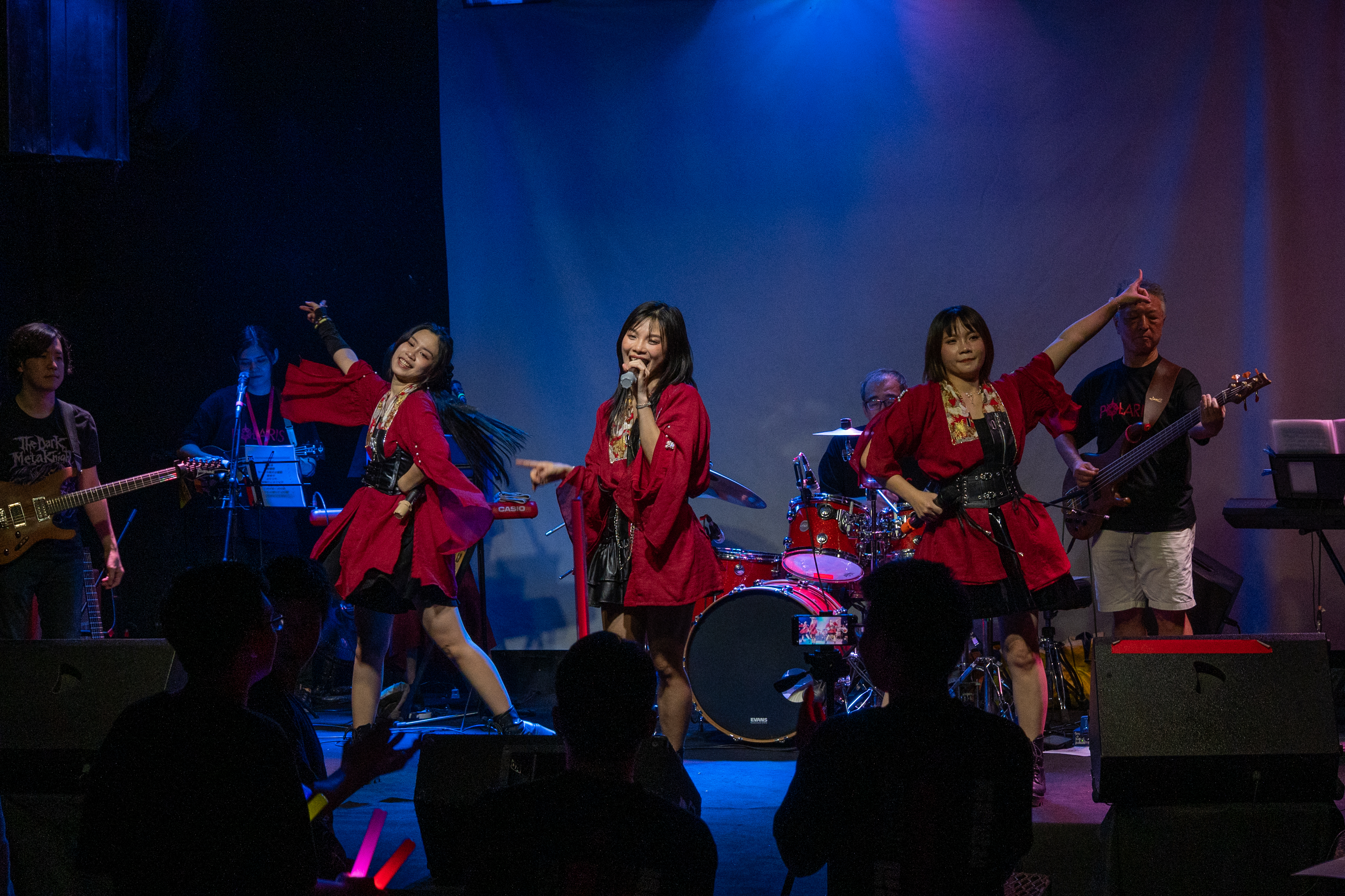 POLARIS members singing on stage